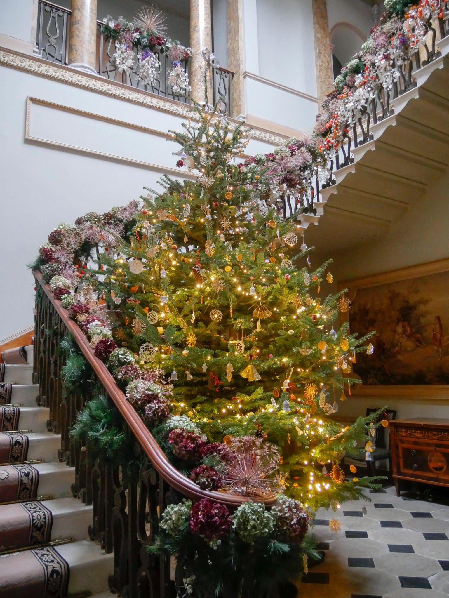 Christmas tree in the staircase hall at Berrington Hall, Herefordshire