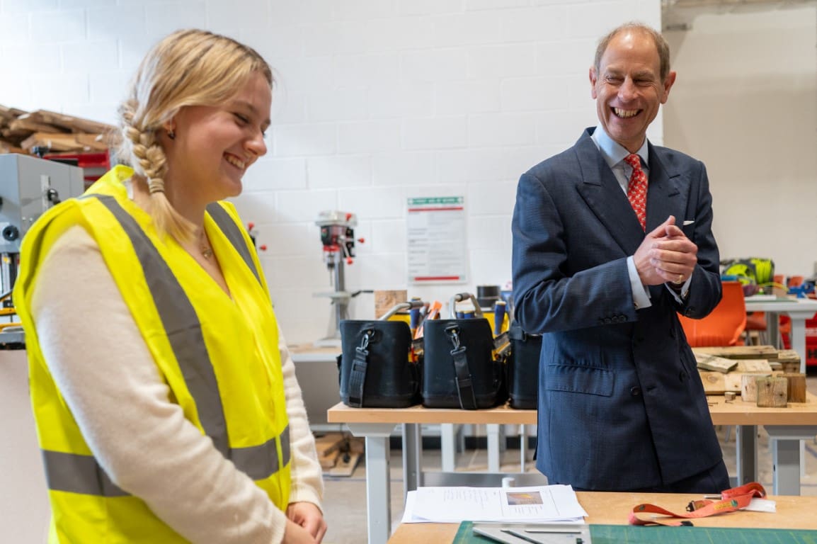 HRH The Duke of Edinburgh laughs with MEng student Grace Keating following a demonstration of her end of year project (Medium)